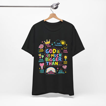 Christian T‑Shirt — "God Is So Much Bigger Than..." Pastel Faith Tee