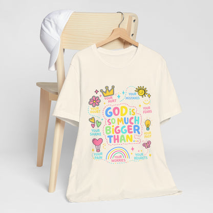 Christian T‑Shirt — "God Is So Much Bigger Than..." Pastel Faith Tee