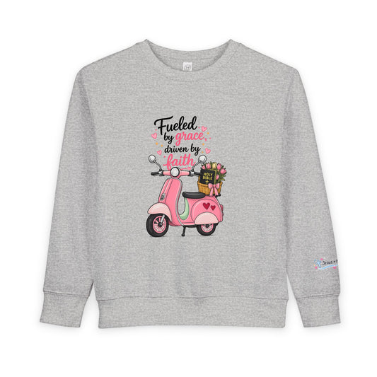 Toddlers' Faith Sweatshirt — "Fueled by Grace, Driven by Faith" Pink Scooter