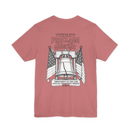 Proclaim Liberty Tee — Liberty Bell & Flags Bible Verse (Leviticus 25:10)
