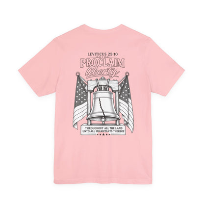 Proclaim Liberty Tee — Liberty Bell & Flags Bible Verse (Leviticus 25:10)