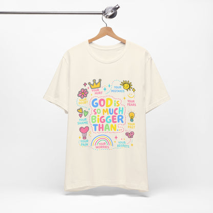 Christian T‑Shirt — "God Is So Much Bigger Than..." Pastel Faith Tee