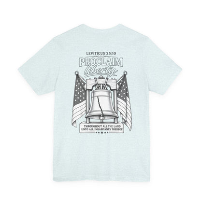 Proclaim Liberty Tee — Liberty Bell & Flags Bible Verse (Leviticus 25:10)
