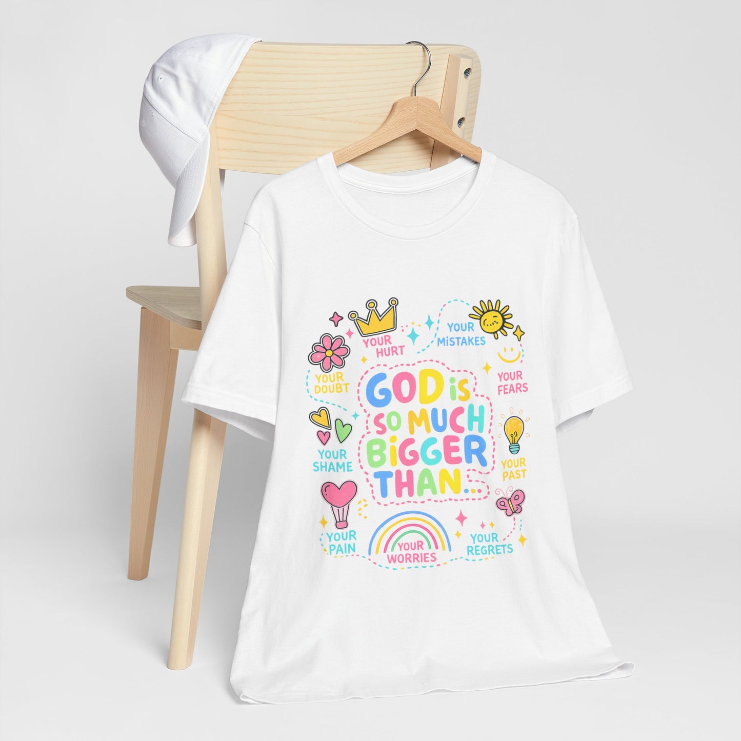 Christian T‑Shirt — "God Is So Much Bigger Than..." Pastel Faith Tee