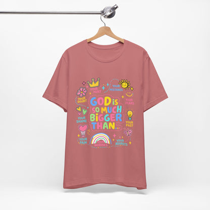 Christian T‑Shirt — "God Is So Much Bigger Than..." Pastel Faith Tee