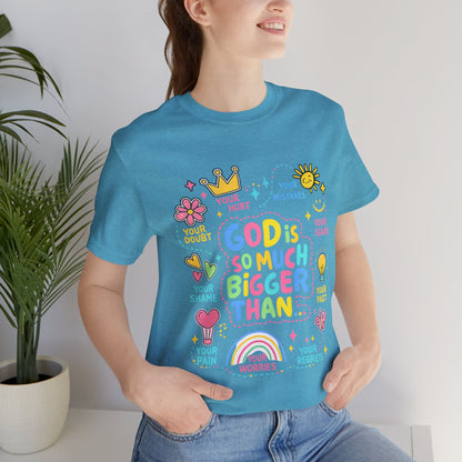 Christian T‑Shirt — "God Is So Much Bigger Than..." Pastel Faith Tee
